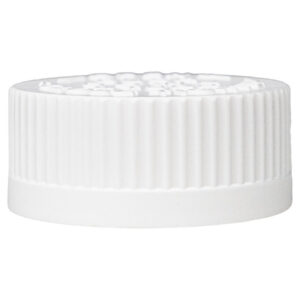 White plastic bottle cap on a plain background.