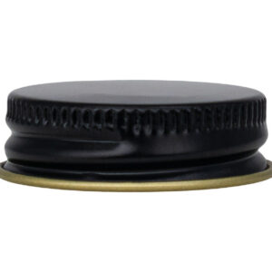Black bottle cap on a gold base.