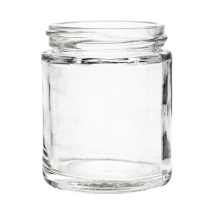 Empty glass jar on white background.